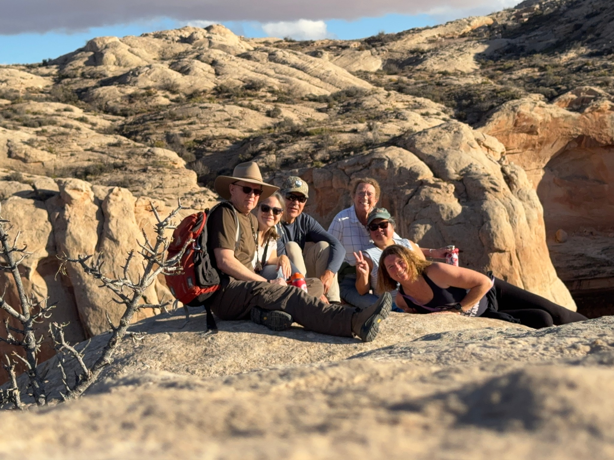 Hikers exploring red rock formations near Bluff Utah